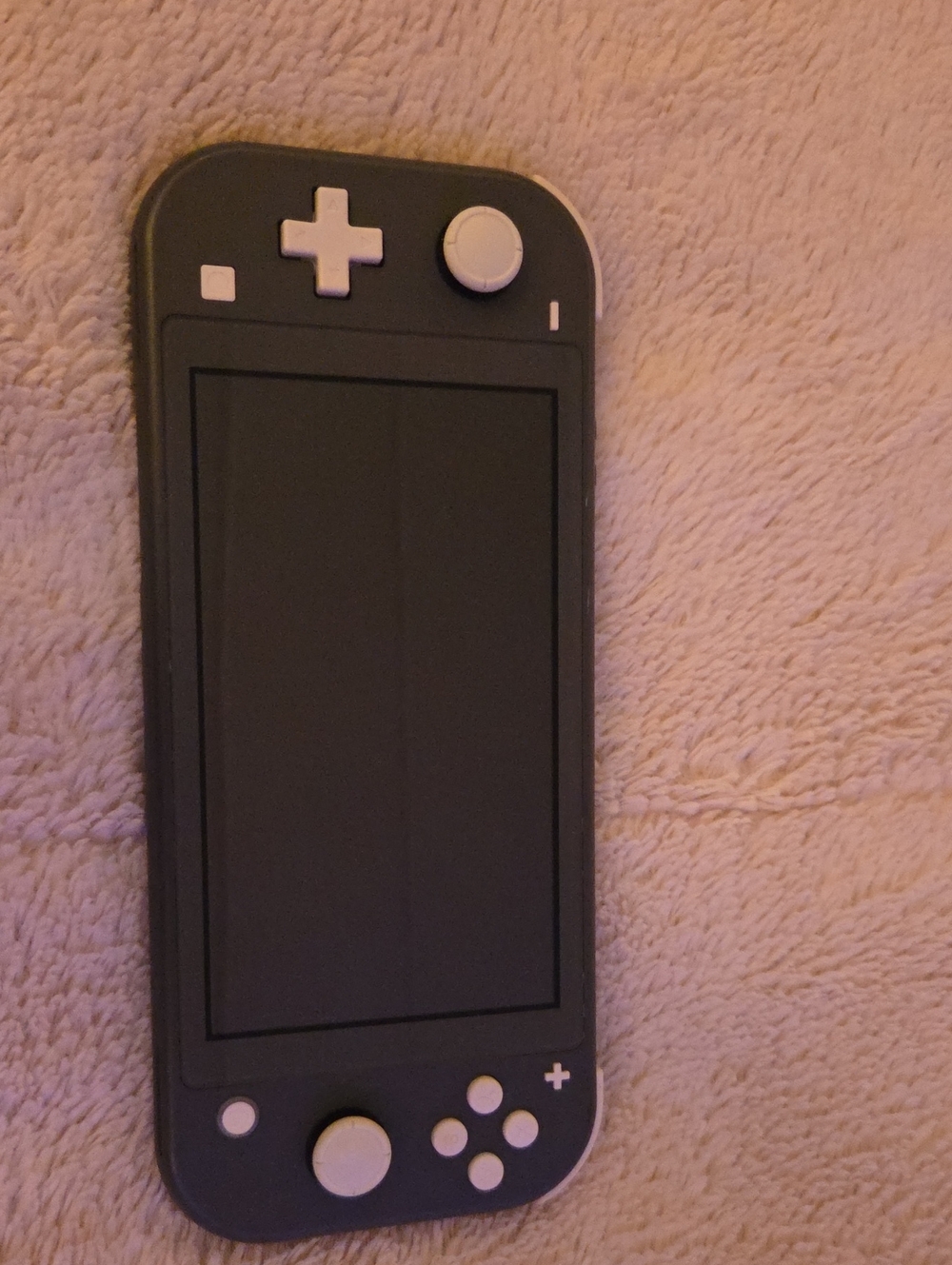 Nintendo Handheld Gaming Console in Black and White